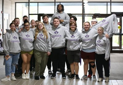 Photos of the Goshen College Mens & Womens Bowling Team wearing their bowling sweatshirts.