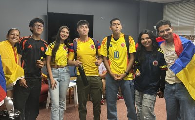 LSU leadership students line up for a photo showing off the Columbian flag