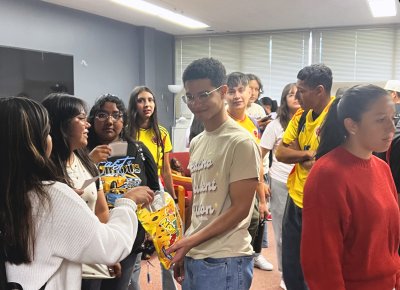 Group of students trying snacks and treats from Colombia for the LSU Taste of Colombia event