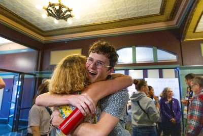 Two friends hug at Connectapalooza!