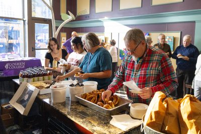 Community members choose snacks and drinks