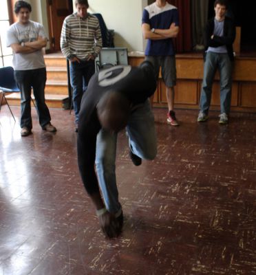 Camilo Ballumbrosio shows students an especially difficult tap dance move.
