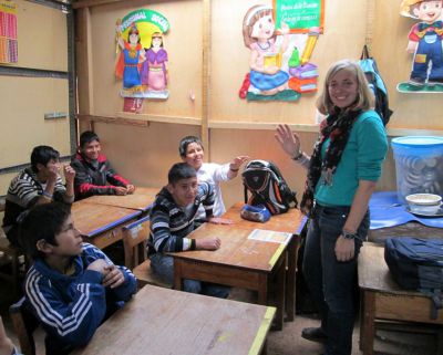 Abby talks with students in her classroom at San Martin, a public school that serves deaf children in Cusco.