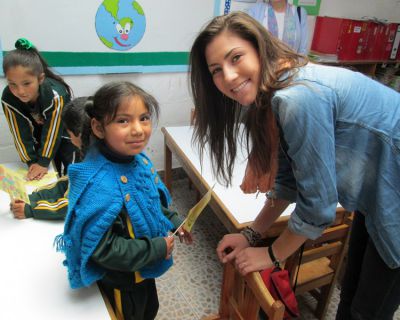 Maddie talks with a little girl in her classroom at Promesa school in San Jeronimo.