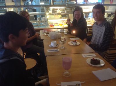 Peter with a piece of black forest cake for his birthday.