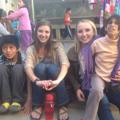 At the Casa Luz orphanage, Morgan and Kate hang out with some of the older children.