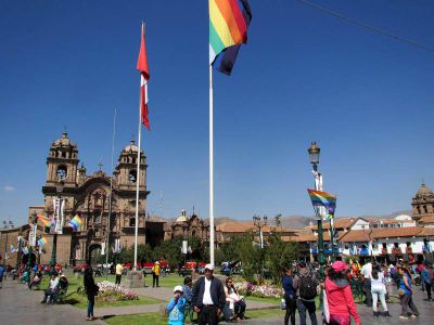 The Cusco flag flies along with the Peruvian flag.