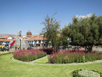 The plaza is full of flower beds - and people.