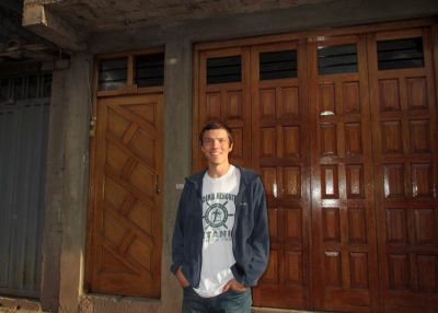 Peter outside his San Jeronimo home, where his father has a workshop.