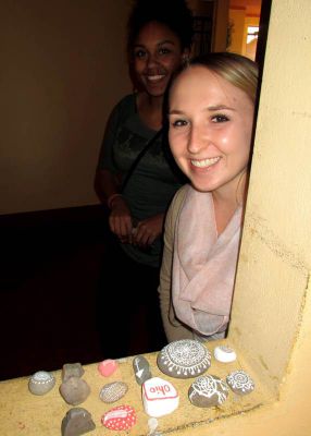 Kate and Asia in the upstairs of their home.