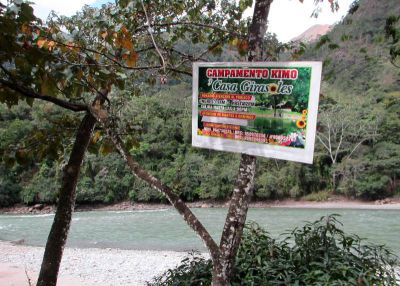 A sign for Casa Girasoles at Kimo greets us as we wait to cross the river.