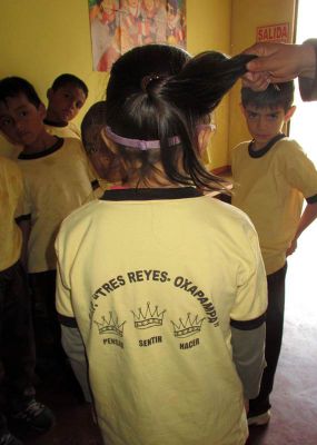 The uniform worn by the Tres Reyes children, "Think, Feel, Do" is their moto.