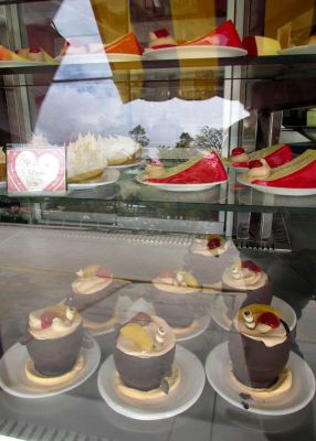 A few of the many desserts available in the Feliz Dia display case.