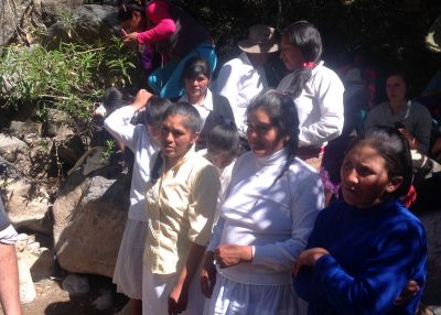 Irene and her mother with several of the villagers who were baptized during the weekend.