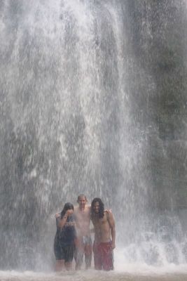 Under a waterfall.